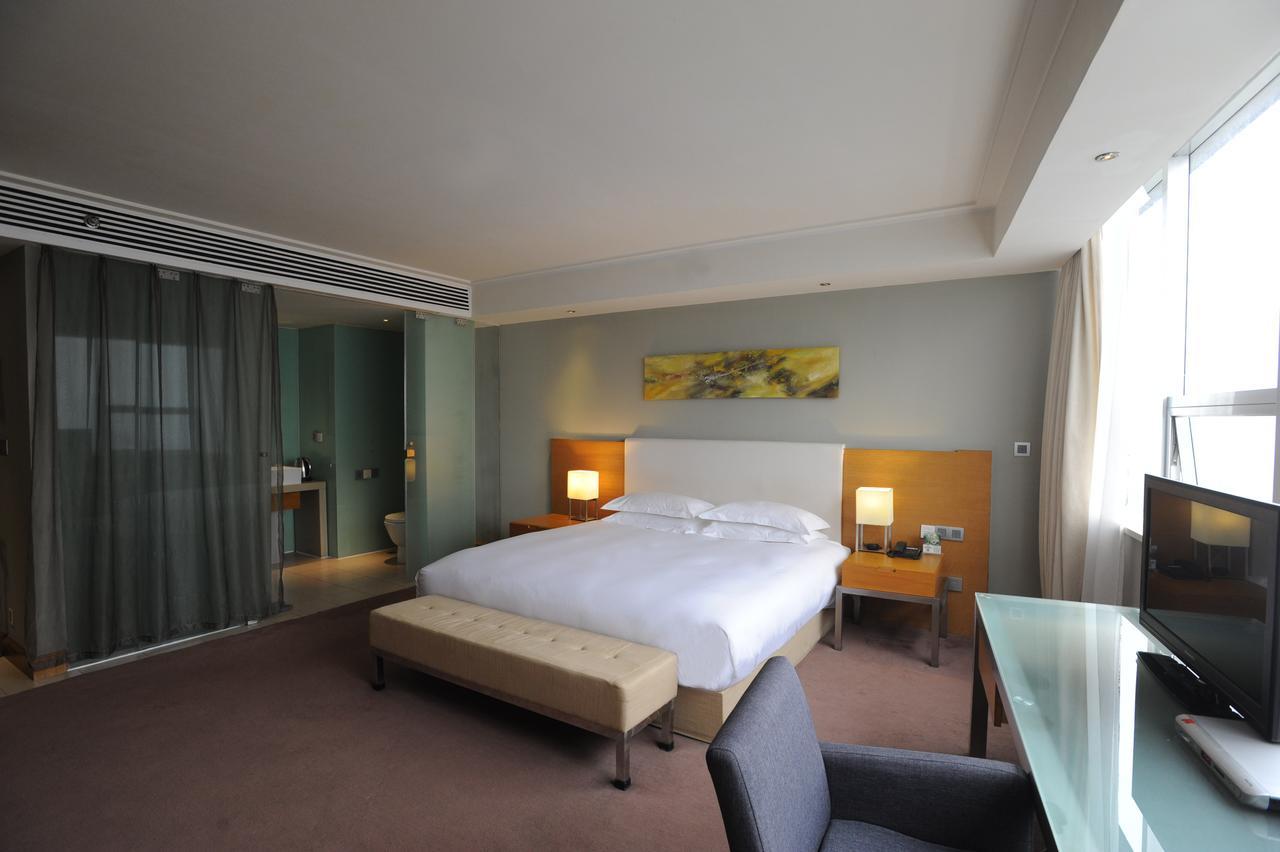 Tang's Hotel Changde Bagian luar foto