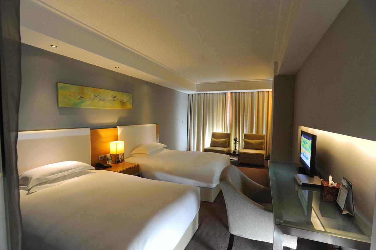 Tang's Hotel Changde Bagian luar foto