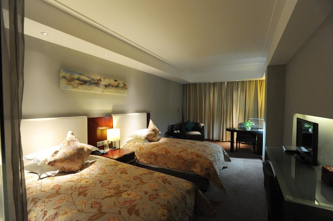 Tang's Hotel Changde Bagian luar foto