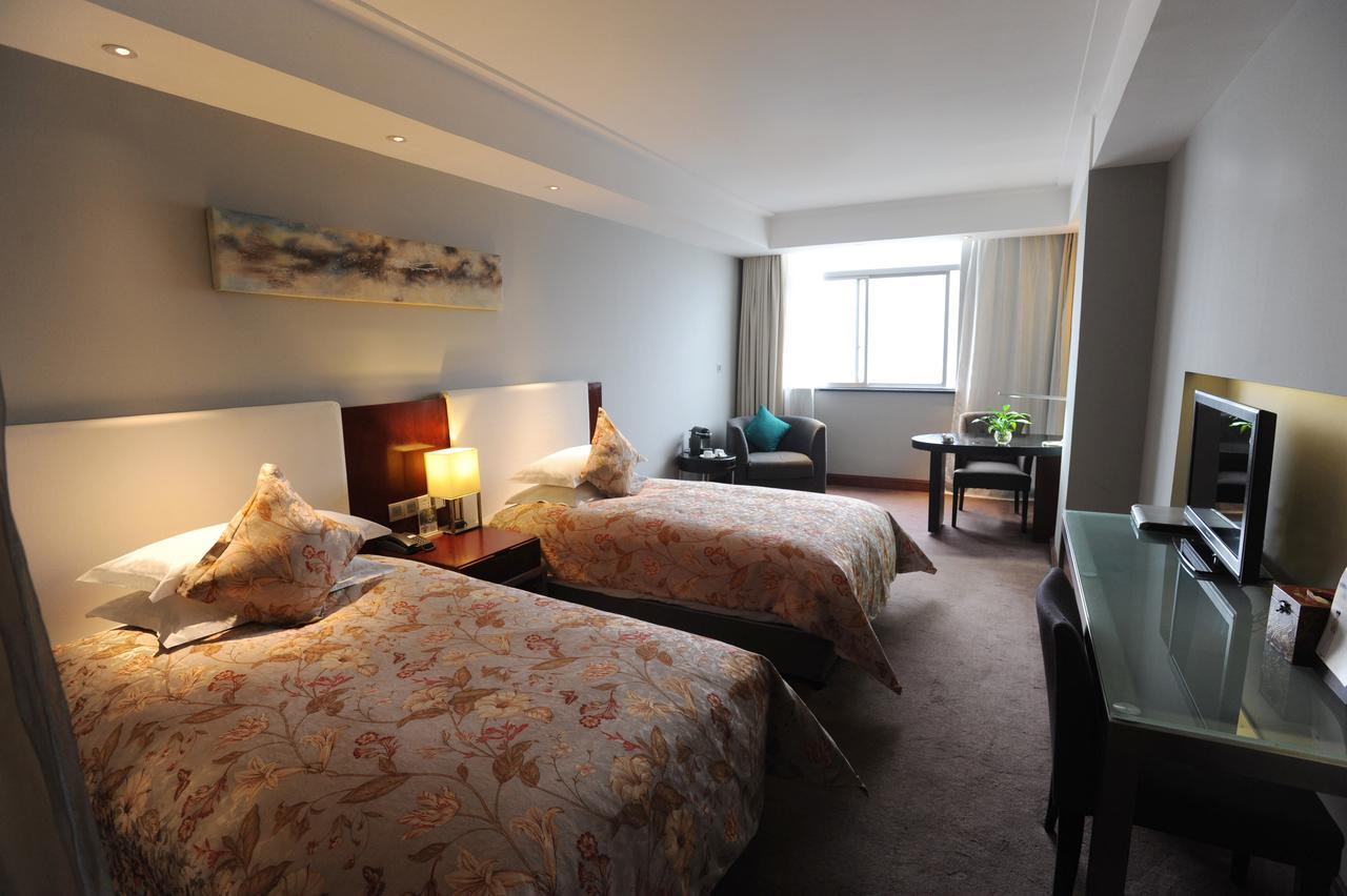 Tang's Hotel Changde Bagian luar foto