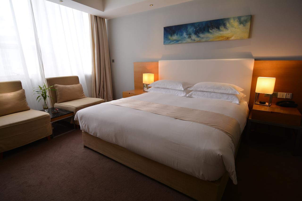 Tang's Hotel Changde Bagian luar foto